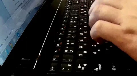 Typing on a laptor keyboard Stock Footage 46920284
