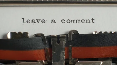 Typing "leave a comment" on typewriter Video stock 87351463