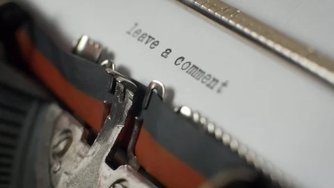 Typing "leave a comment" on typewriter Video stock 87351774