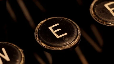 Typing letter E on vintage typewriter Video stock 78956478