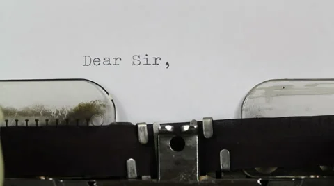 Typing Letter starting with Dear Sir on Typewriter Stock Footage 61868077