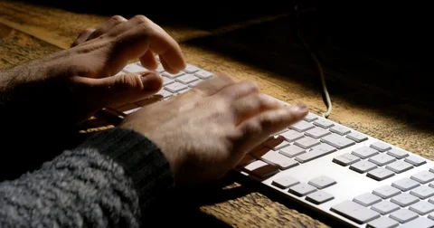 Typing on Mac Keyboard (Moody Atmospheric Lighting) Stock Footage 75078368