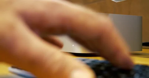 Typing with Mac Studio M4 Max in Background Stock Footage 312177895