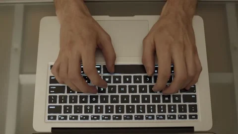 Typing on Macbook Air Laptop Video stock 150054385