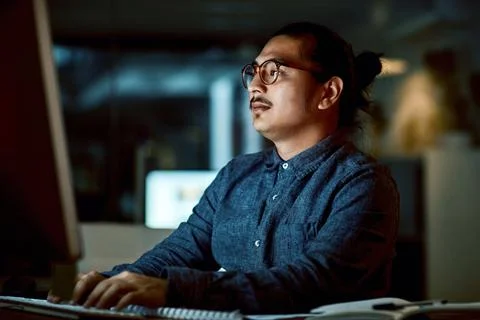 Typing, man and computer in office at night for urgent bug fix, troubleshoo.. Stock Photos