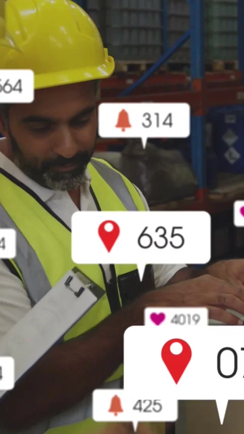 Typing man in hard hat vest entering laptop data at packing station clipboard Stock Footage 334544113