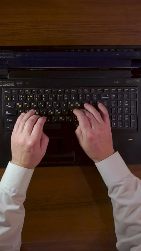 Typing man. A man typing on a computer keyboard 動画素材 320542771