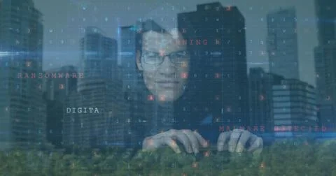Typing man wearing glasses generating floating code overlays in park, with tree Foto stock