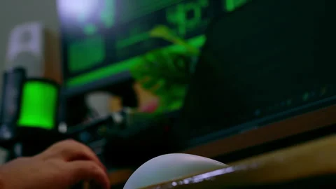 Typing on a Mechanical Keyboard in a Hacker Environment with Green Code Reflecti Stock Footage 313068259