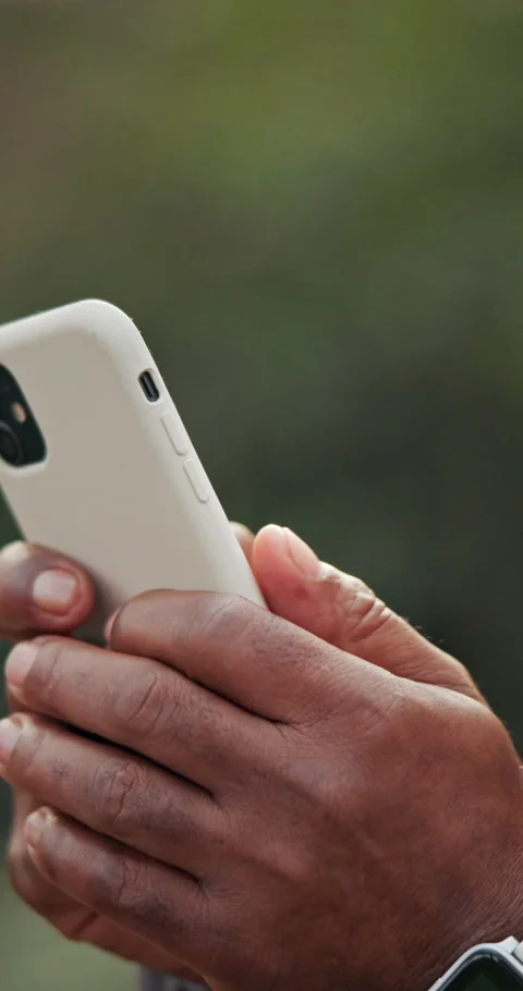 Typing, message and hands with phone, outdoor and communication with contact on Stock Footage 340966914