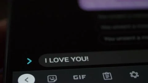 Typing message I Love You on smartphone, close-up. Stock Footage 154497902