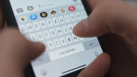 Typing message on iPhone: Whats up mate? [6K30] Stock-Footage 127633689