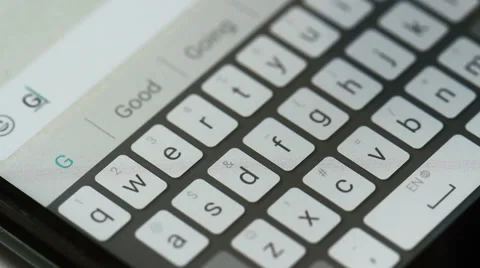 Typing message on mobile phone good morning Video stock 64325590