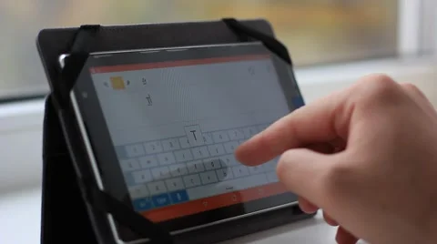 Typing message on tablet computer Stock Footage 64847387