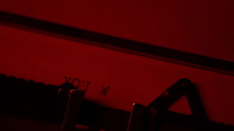 Typing the Message ‘You Will Die’ on a Typewriter Stock Footage 318590407