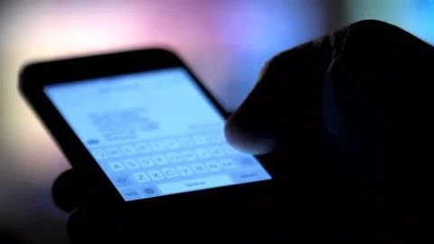 Typing on mobile  Stock Footage 210217524