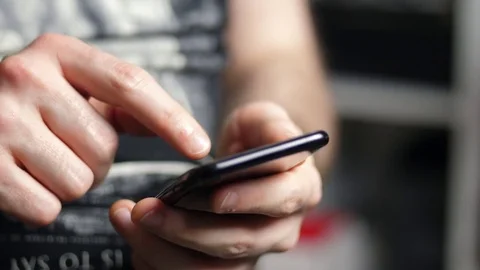 Typing on mobile phone Stock Footage 84884996