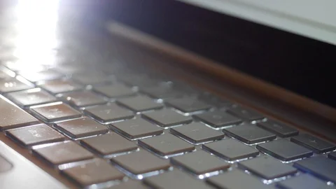 Typing on modern Laptop Computer at night in Slow Motion Stock-Footage 124703398