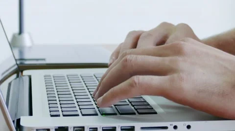Typing on a Modern Laptop Stock Footage 58688156