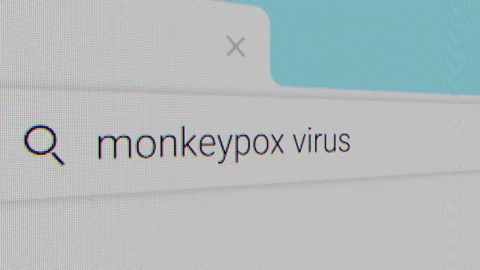 Typing Monkeypox as keyword in search bar in search engine Stock Footage 201274326