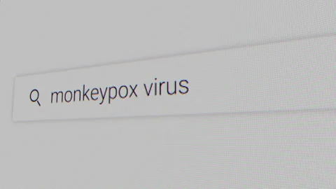 Typing Monkeypox as keyword in search bar in search engine Stock Footage 201274452