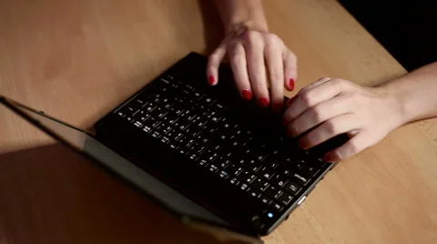 Typing on netbook computer Stock Footage 41543813