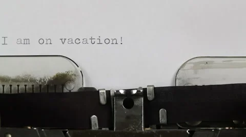 Typing Note - I am on Vacation on Typewriter  Stock Footage 61869647
