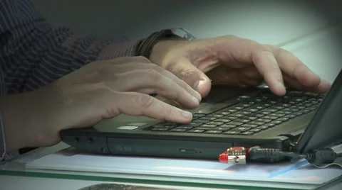 Typing on notebook Video stock 38774927