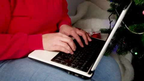 Typing on notebook neat Christmas tree Video stock 167274173