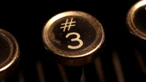 Typing number 3 on vintage typewriter Stock Footage 78991007
