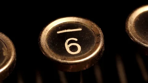 Typing number 6 on vintage typewriter Stock Footage 78991006