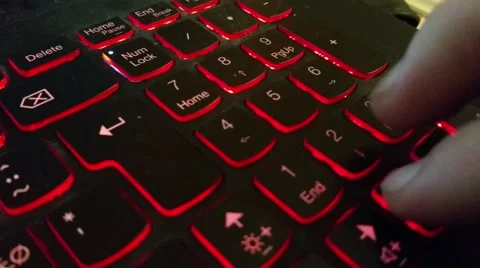 Typing numbers on a black keyboard.mp4 Stock Footage 58026034