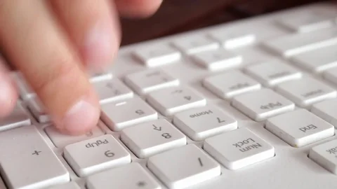 Typing on numbers close Stock Footage 76680527