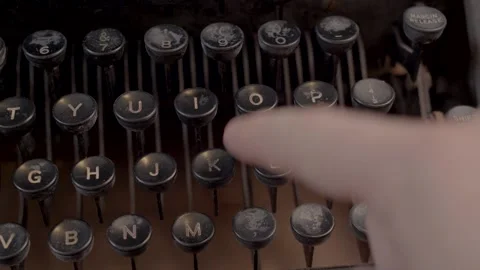 Typing "OK" on a vintage typewriter 4K Stock Footage 243396935