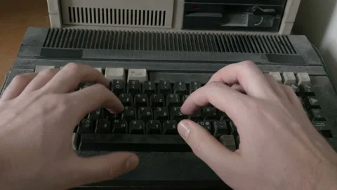 Typing on old computer Stock Footage 91313237
