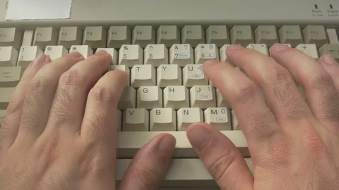 Typing on an old retro computer keyboard Stock Footage 111901653