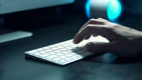 Typing password code to bank account and money transfer numbers on computer keyb Stock Footage 118801945