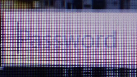 Typing a password on a text field on computer screen, macro closeup Stock Footage 84342402