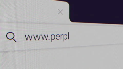 Typing for "perplexity.ai" in an Internet Search Engine on a Computer. Browser Stock Footage 314812064