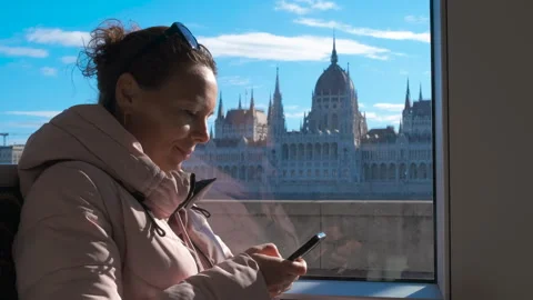 Typing on phone in tramway. Stock Footage 252614582