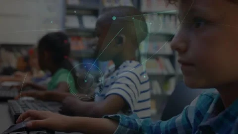 Typing plaid boy using keyboard and mouse school lab after camera pullback for Stock Footage 332285886