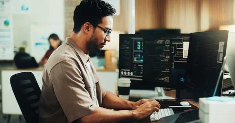 Typing, programmer and computer with business man in office for web develop.. Stock Photos