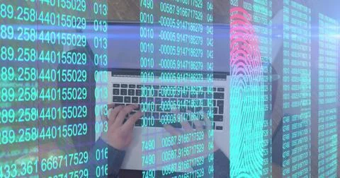 Typing programmer hands pressing laptop keys at wooden desk, with numeric and Stockfoto's