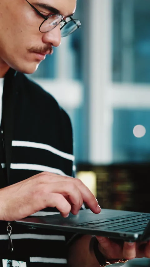 Typing, programming and man in office, laptop for software development and 動画素材 333229522