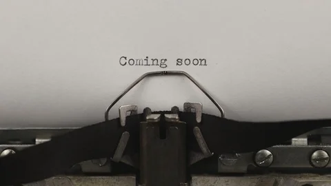 Typing a quote coming soon, old vintage typewriter with a sheet of paper Stock Footage 122006473