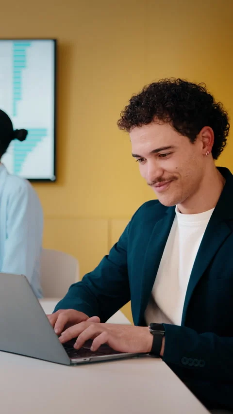 Typing, reading or man with laptop in creative agency, data analysis report or Stock Footage 335754208