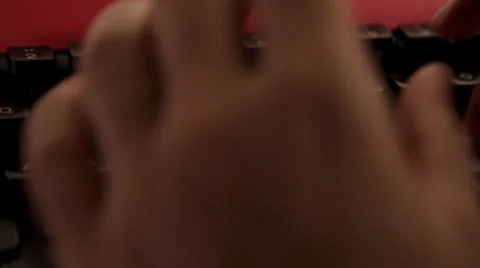 Typing on red typewriter Stock Footage 45618920