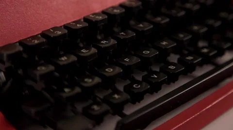 Typing on red typewriter Stock Footage 45619233