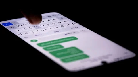 Typing repeated messages on a smartphone for spam messaging Stock Footage 340121073