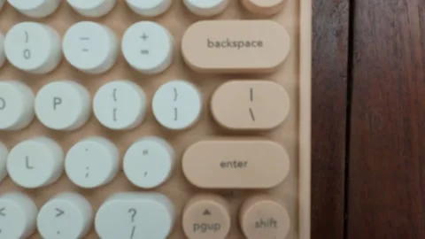 Typing on Retro Style Keyboard with White Keys Close Up 動画素材 311795633